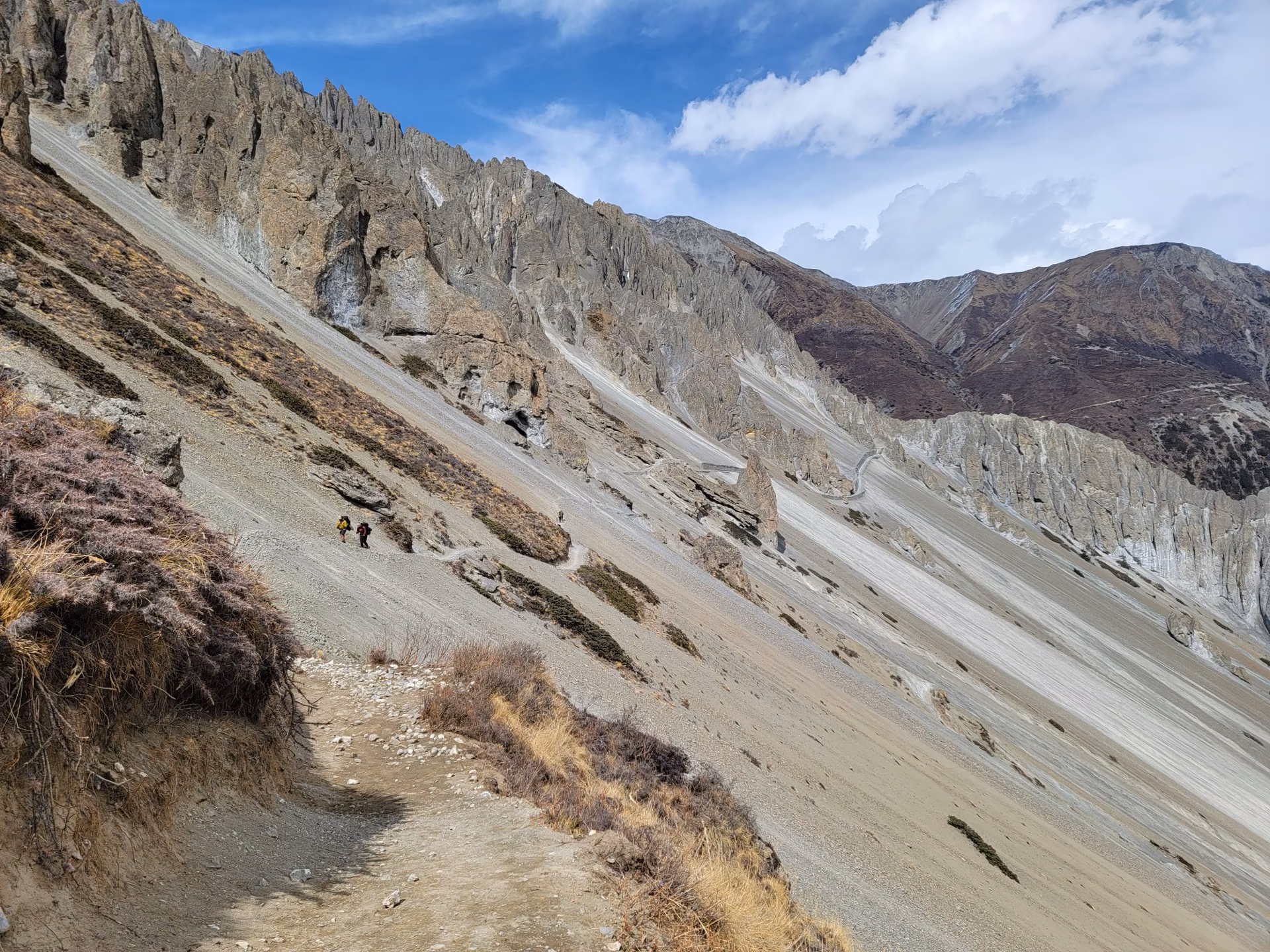 Difficult mountain terrain on a trekking route in wet conditions
